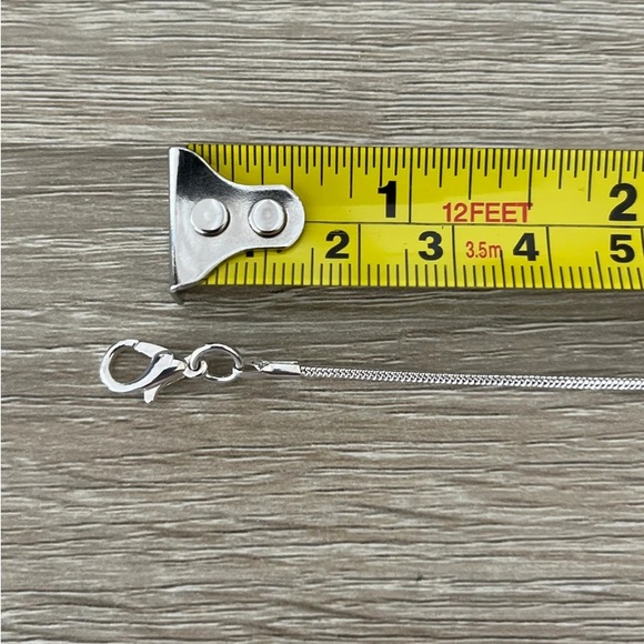 A Silver-Tone Simulated Polished Abalone and Rhinestone Kenneth Cole Necklace - Picture 8 of 10